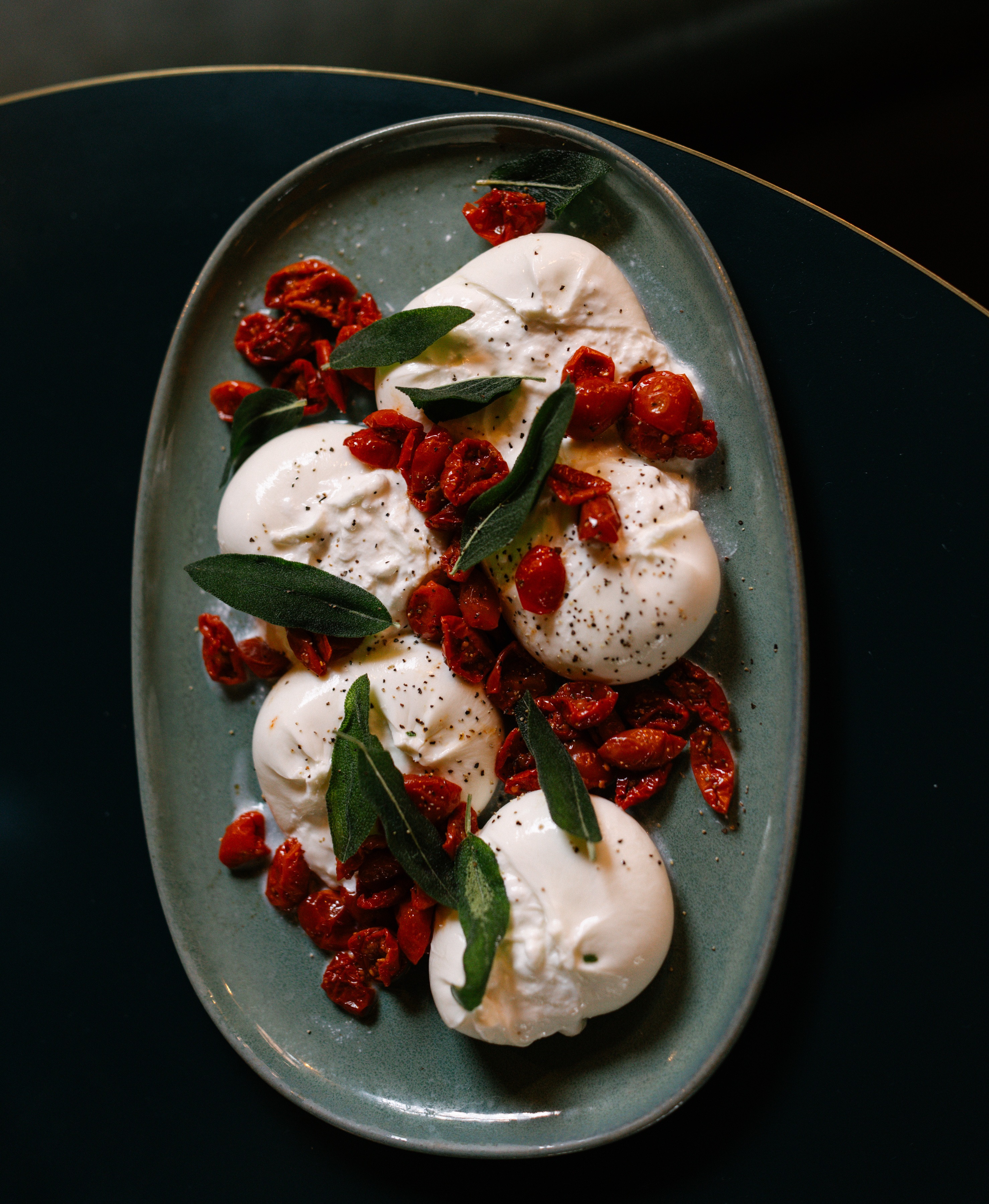 Roscioli NYC Premium Italian Catering – Burrata with Roasted Tomatoes Premium Italian burrata dish by Roscioli NYC — ideal for offsite, private, and event catering.